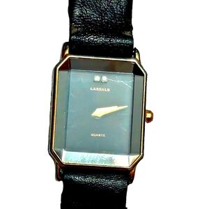 Womens LaSalle gold toned case band still have its original. Working like new